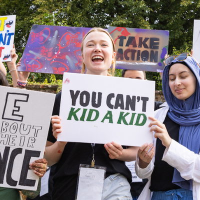 Bite Back activists with protest signs